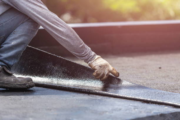 Professional Basement Waterproofing technician working in Mount Olivet, KY